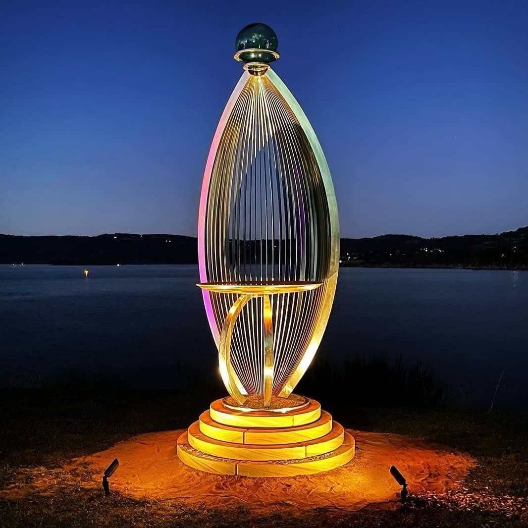 Sculpture for Jindabyne installation NSW, lit up at night on the lake