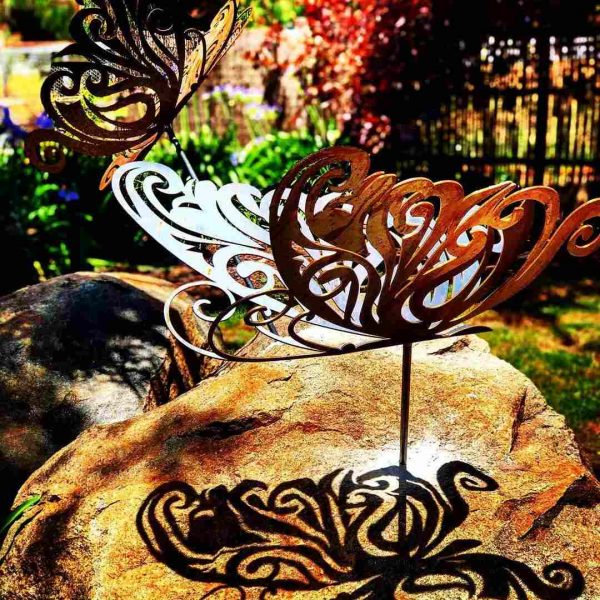 Australian made butterfly sculptures on granite boulders for garden in Murrumbateman NSW