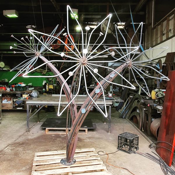 large metal abstract flower sculpture