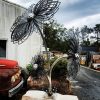 large metal flowers sculpture by Geyson