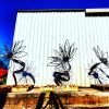 three flower sculptures